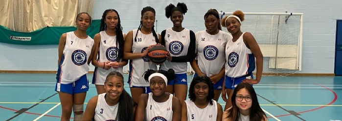 St Peter's Collegiate Academy's Girls' Basketball Team celebrating after a victory.